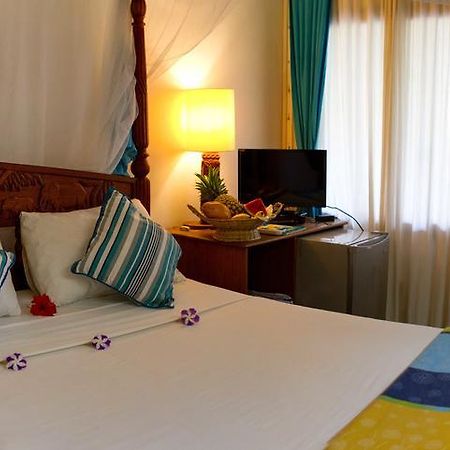 Mangro Hotel Playa de Diani Habitación foto