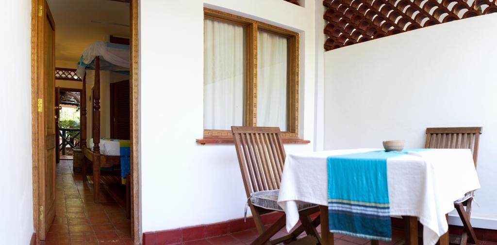 Mangro Hotel Playa de Diani Habitación foto